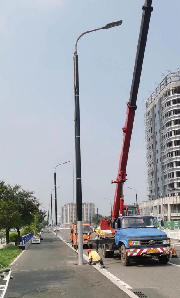 560pcs Project Of Solar Wrap Pole With Flexible Solar Panel On Pole-NEWLIGHT ENERGY